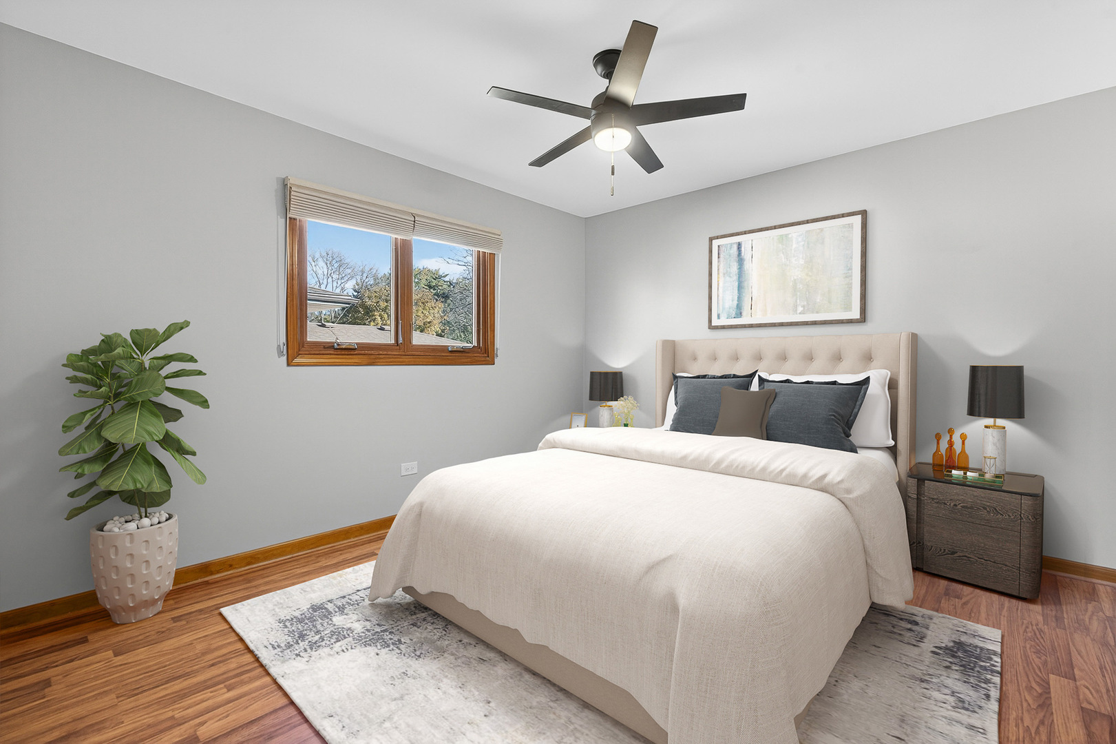 7800 Brunswick Road Darien, IL 60561 - Photo 16 of 33 a bedroom with a large bed and a potted plant