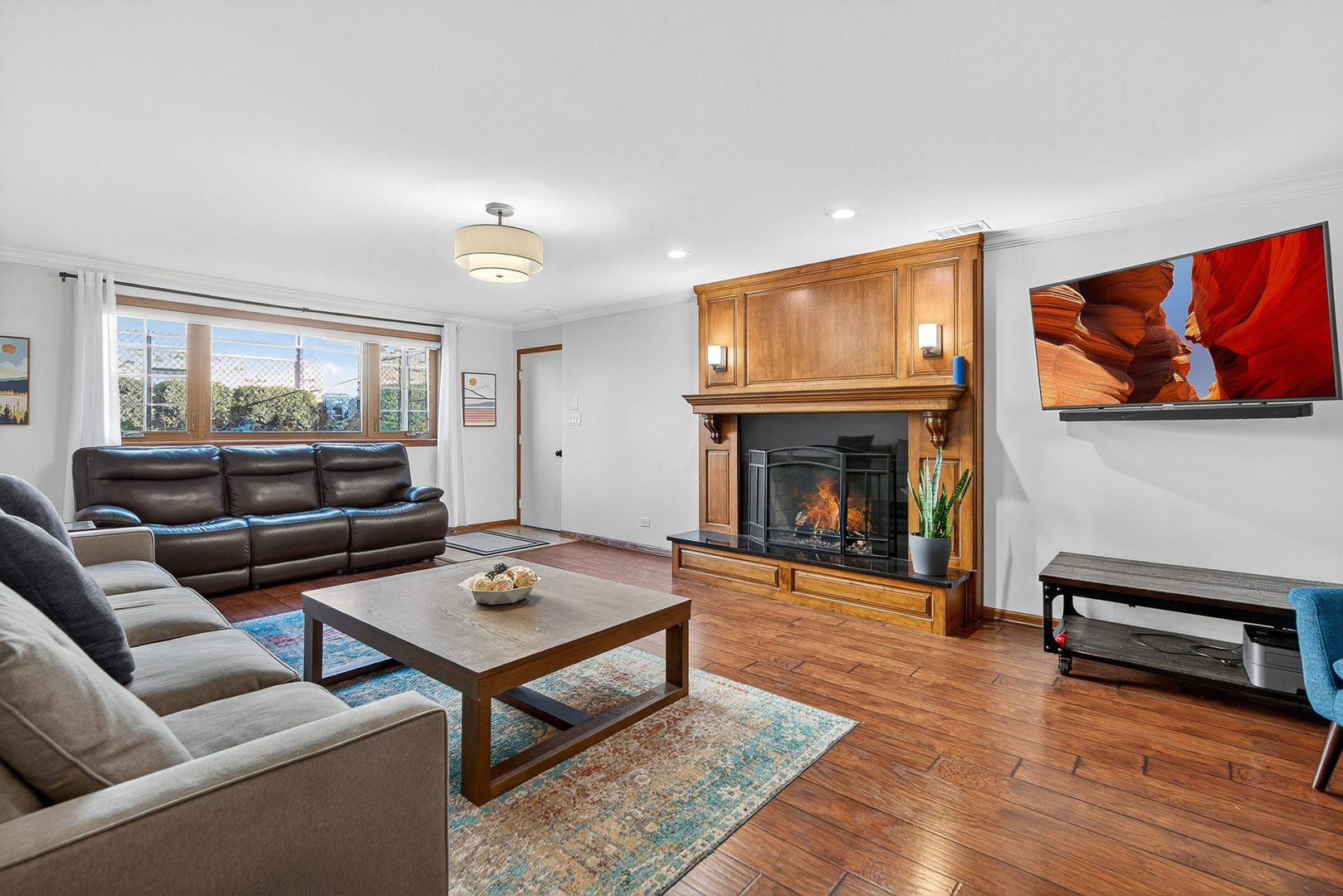 7800 Brunswick Road Darien, IL 60561 - Photo 17 of 33 a living room with furniture and a fireplace