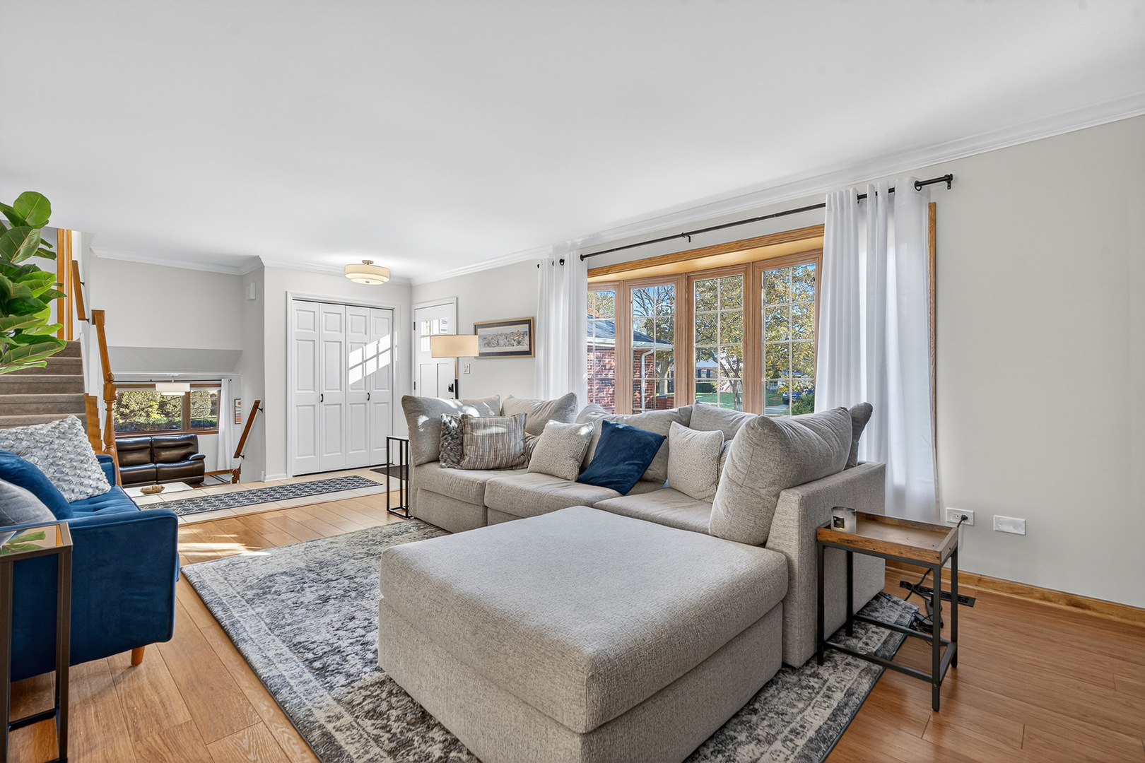 7800 Brunswick Road Darien, IL 60561 - Photo 2 of 33 a living room with furniture and a large window