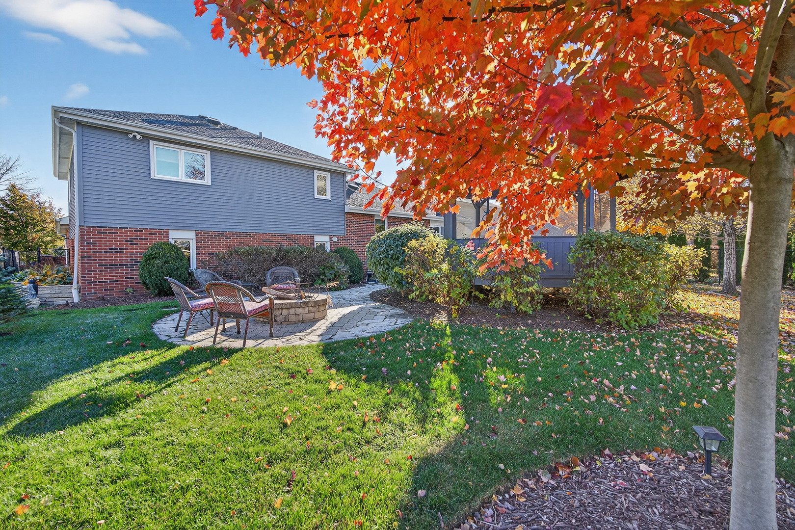 7800 Brunswick Road Darien, IL 60561 - Photo 30 of 33 a view of a backyard with sitting area