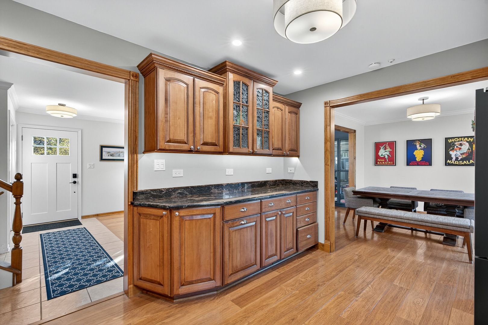 7800 Brunswick Road Darien, IL 60561 - Photo 10 of 33 a kitchen with granite countertop a stove and cabinets