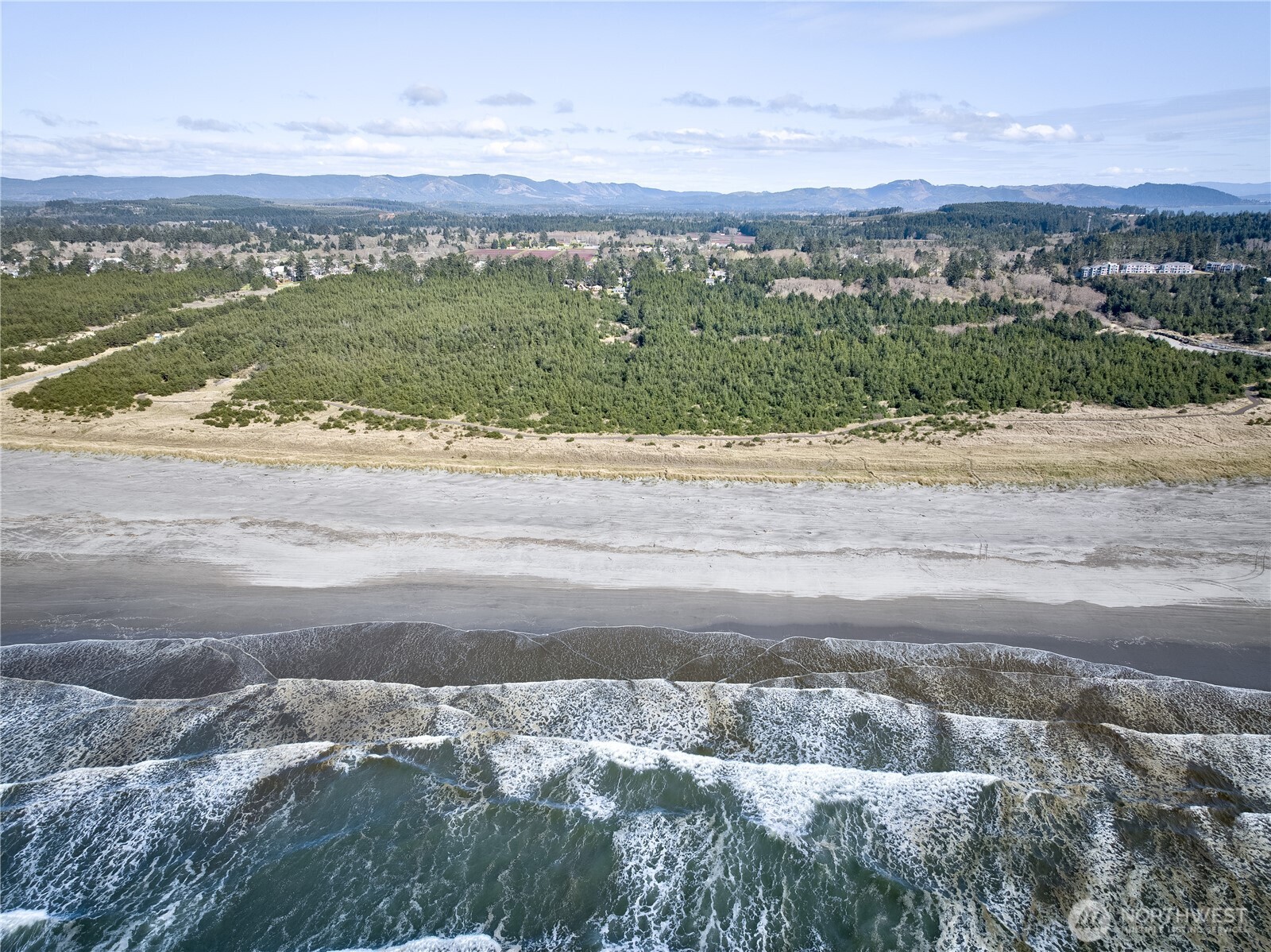 0 35th & J Lane Seaview, WA 98644 - Photo 16 of 26 a view of a lake with a mountain