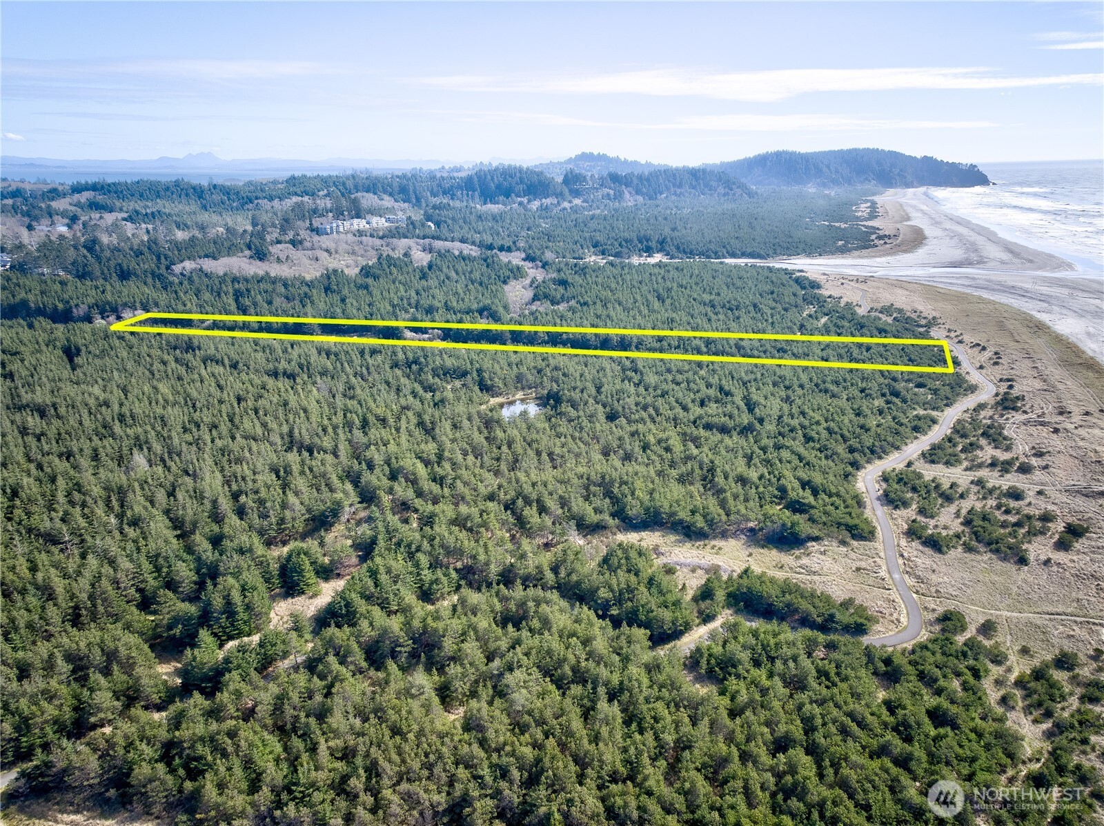 0 35th & J Lane Seaview, WA 98644 - Photo 19 of 26 a view of a city with mountains in the background