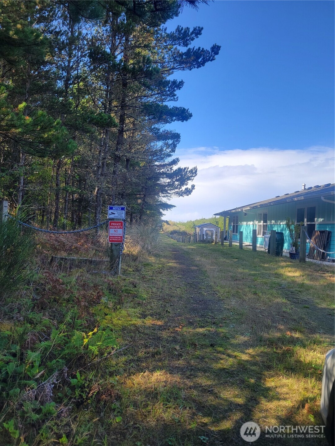 0 35th & J Lane Seaview, WA 98644 - Photo 3 of 7 a backyard of a house with lots of green space