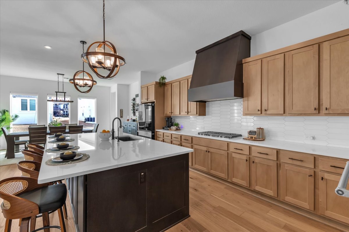 2312 Mondello Path Leander, TX 78641 - Photo 24 of 40 a kitchen with a sink cabinets and window
