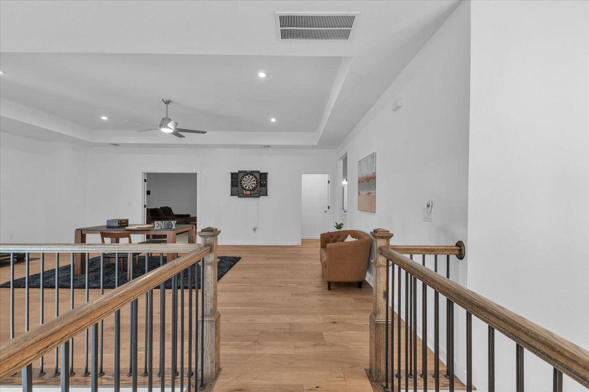 2312 Mondello Path Leander, TX 78641 - Photo 27 of 40 a view of a hallway with workspace