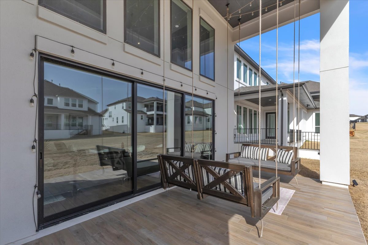 2312 Mondello Path Leander, TX 78641 - Photo 34 of 40 a dinning table and chairs in the balcony