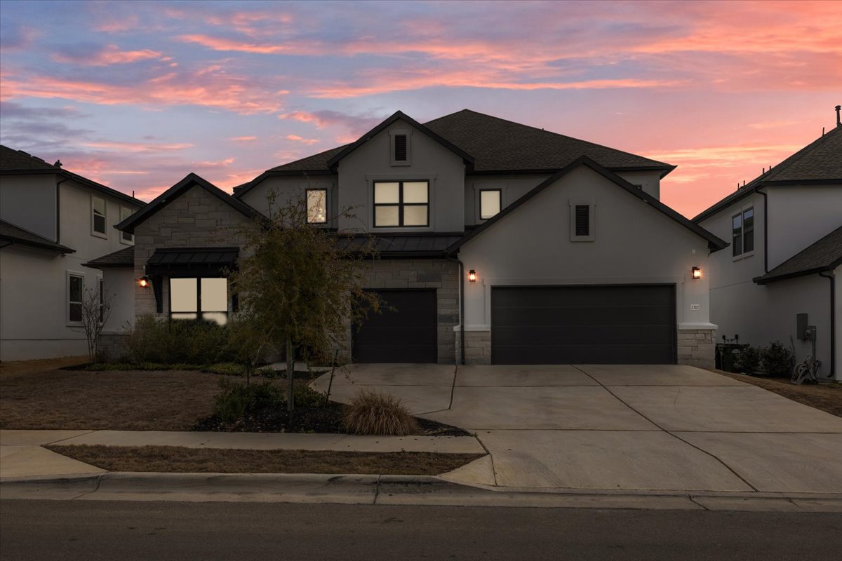 2312 Mondello Path Leander, TX 78641 - Photo 35 of 40 a front view of a house with a yard