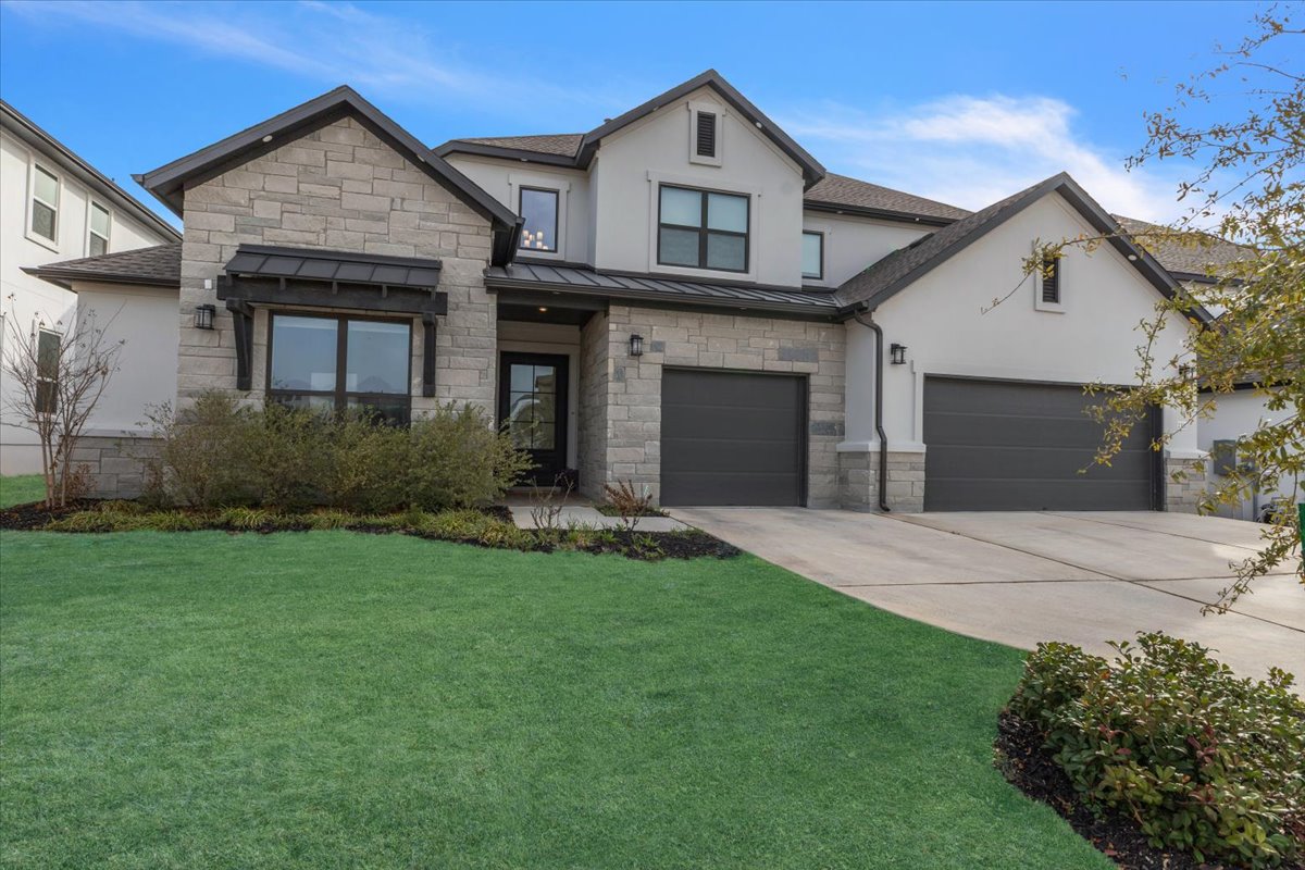 2312 Mondello Path Leander, TX 78641 - Photo 36 of 40 a view of a house with garden and yard
