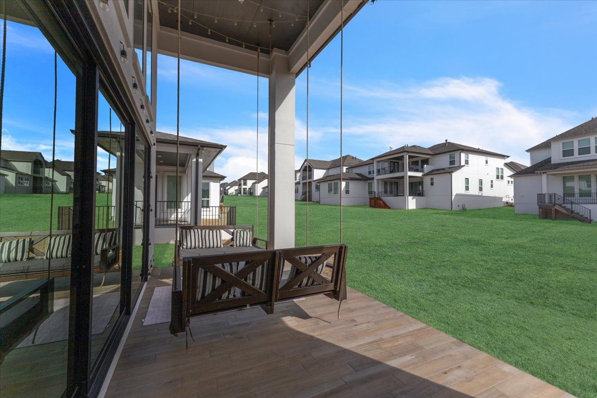 2312 Mondello Path Leander, TX 78641 - Photo 37 of 40 a view of a house with backyard porch and sitting area