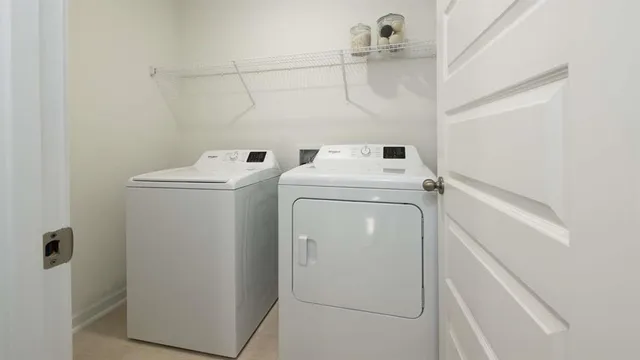 a spacious bedroom with a bed and a window