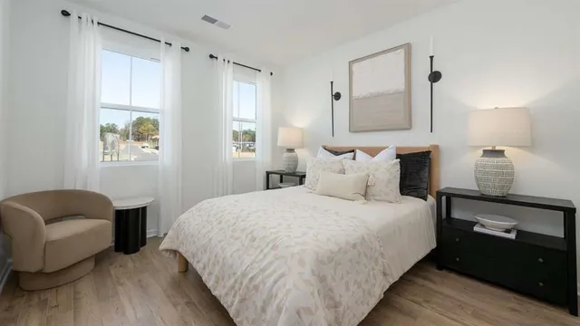 a bed room with a bed and a couch