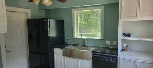 814 East 39th Street Houston, TX 77022 - Photo 15 of 18 a kitchen with a sink and a refrigerator