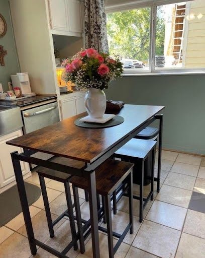 814 East 39th Street Houston, TX 77022 - Photo 7 of 18 a view of a dining room with furniture and window
