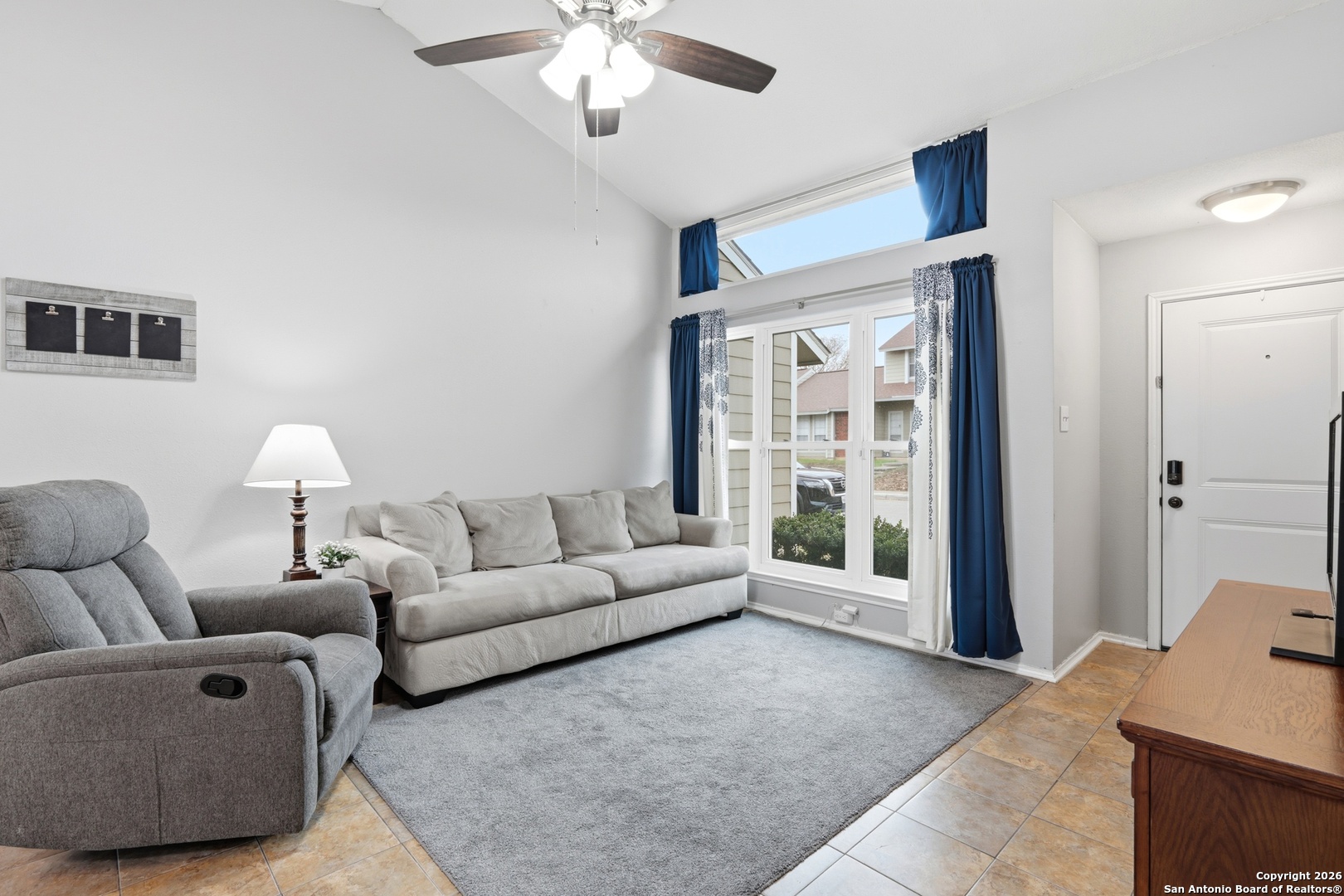 9140 Timber Path, Unit 3003 San Antonio, TX 78250 - Photo 12 of 38 a living room with furniture and a large window