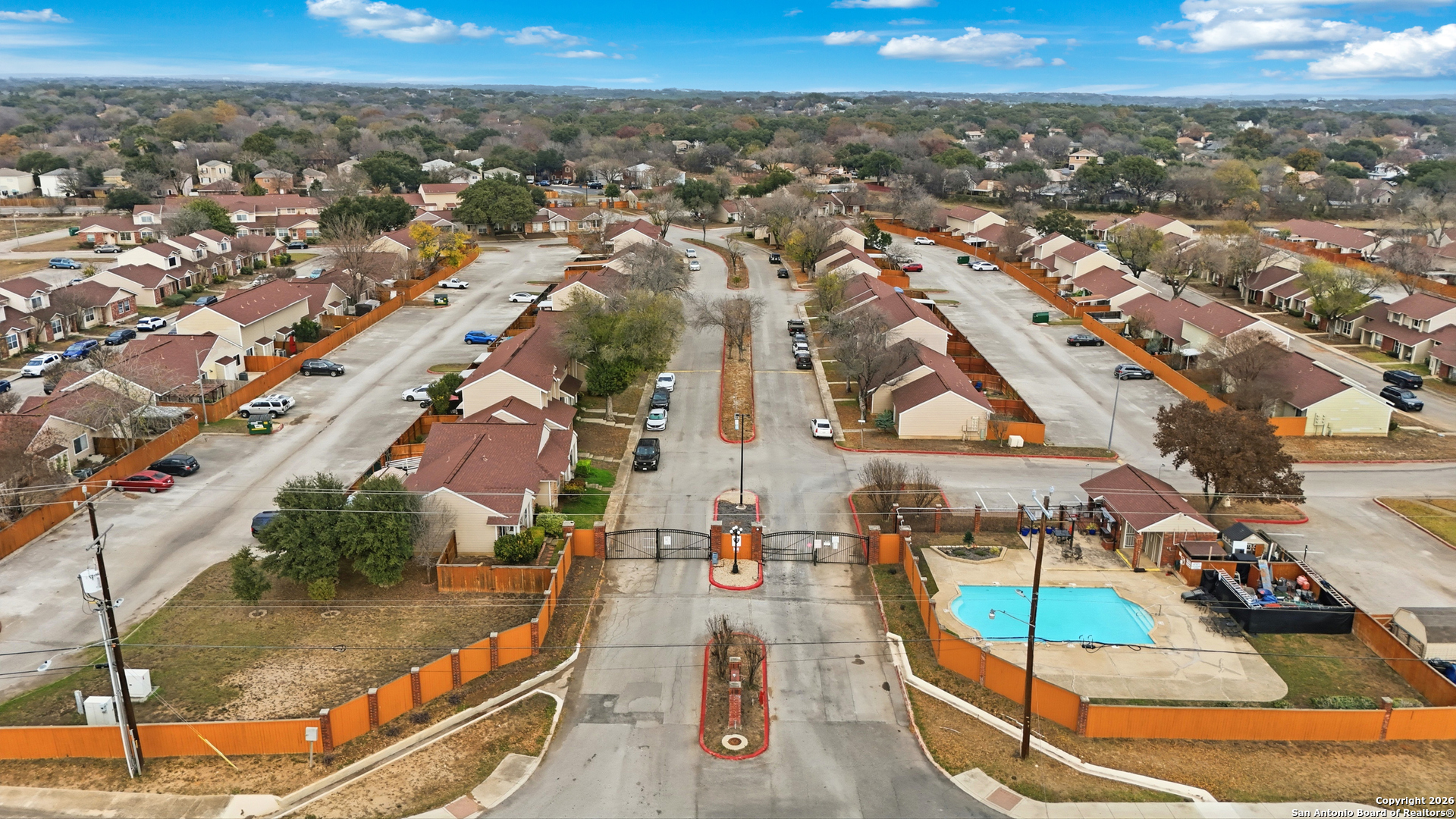 9140 Timber Path, Unit 3003 San Antonio, TX 78250 - Photo 31 of 38 an aerial view of residential houses with outdoor space