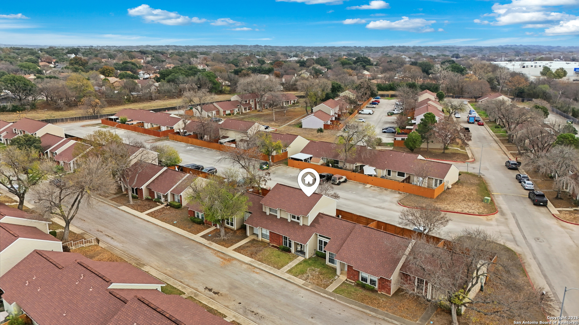 9140 Timber Path, Unit 3003 San Antonio, TX 78250 - Photo 34 of 38 an aerial view of residential houses with outdoor space