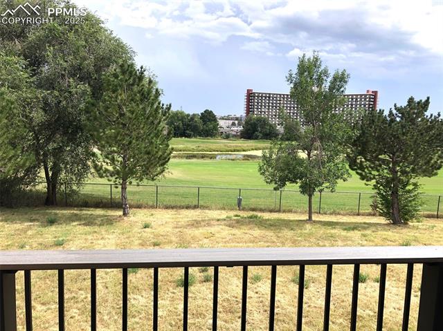 3575 Indigo Ridge Point Colorado Springs, CO 80910 - Photo 12 of 27 water view and view of golf course