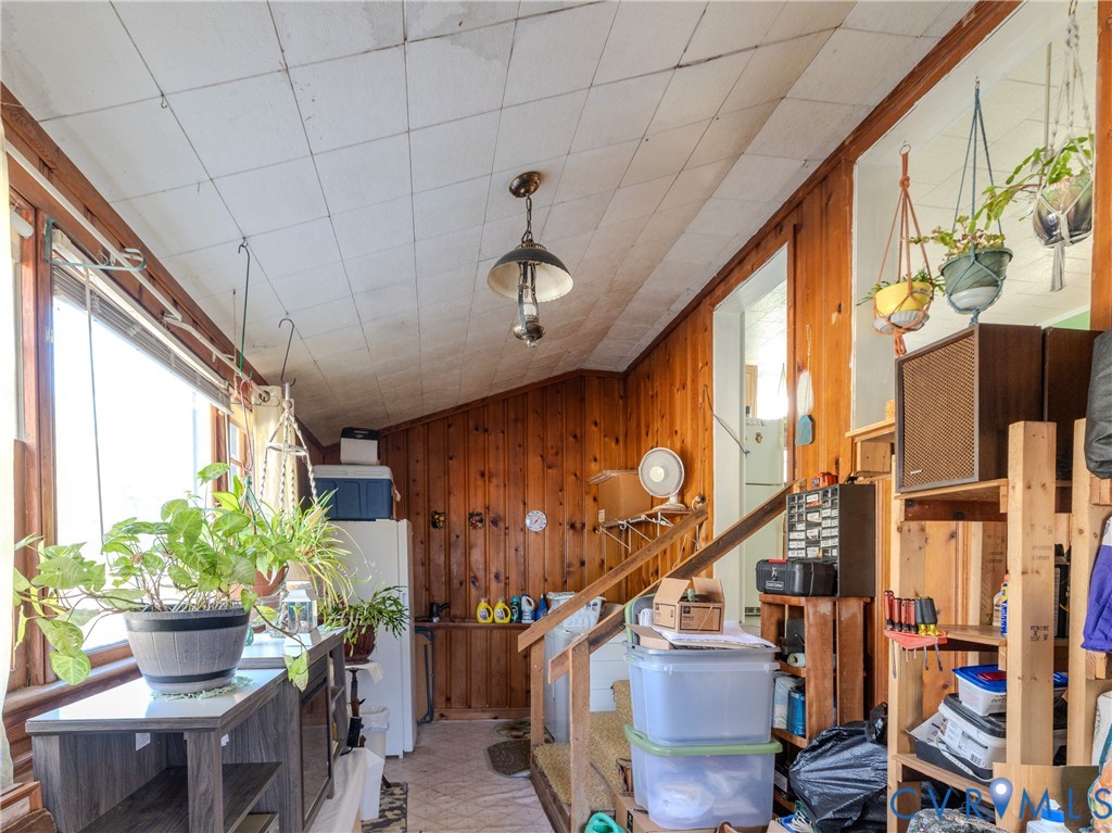 515 Ruthers Road Richmond, VA 23225 - Photo 13 of 34 a potted plant sitting in front of a building