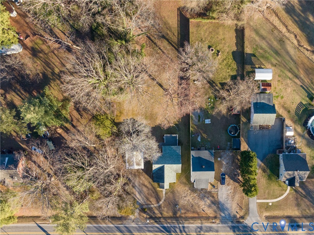 515 Ruthers Road Richmond, VA 23225 - Photo 30 of 34 a backyard of a house with lots of green space