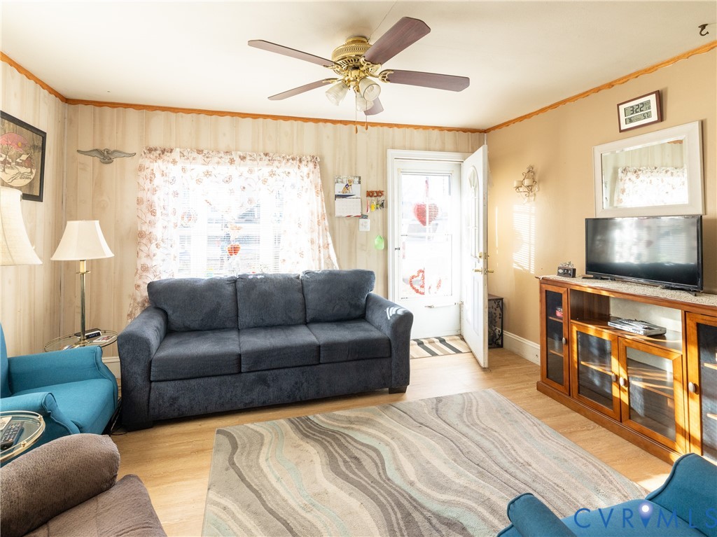515 Ruthers Road Richmond, VA 23225 - Photo 3 of 34 a living room with furniture and a flat screen tv