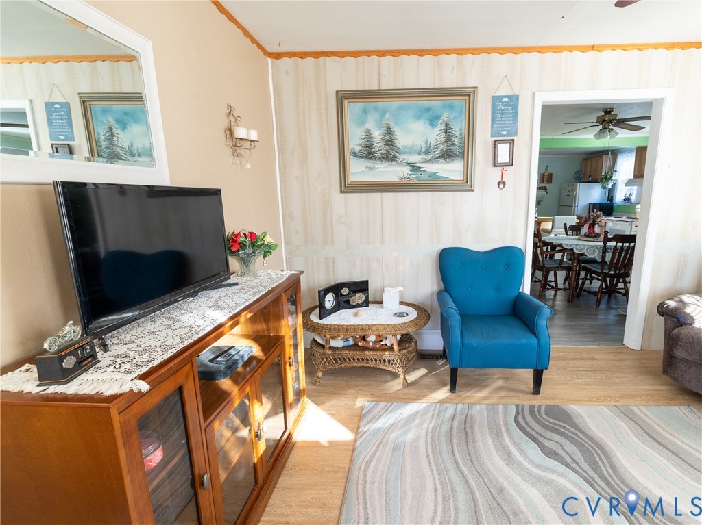 515 Ruthers Road Richmond, VA 23225 - Photo 5 of 34 a bedroom with furniture and a fireplace