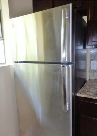 a close view of a refrigerator in kitchen