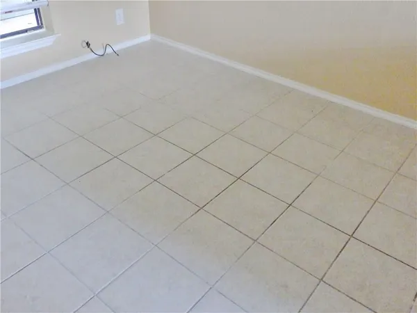 a bathroom with a toilet and a bathtub