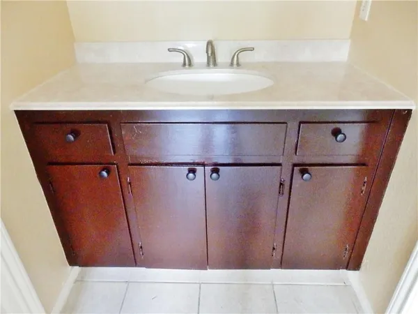 a view of a bathroom from the hallway