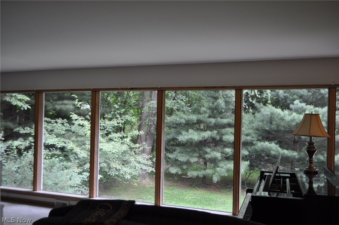 3060 Dresden Road Zanesville, OH 43701 - Photo 11 of 34 Enjoy the view of your back yard from the comfort of your living room and dining room as well