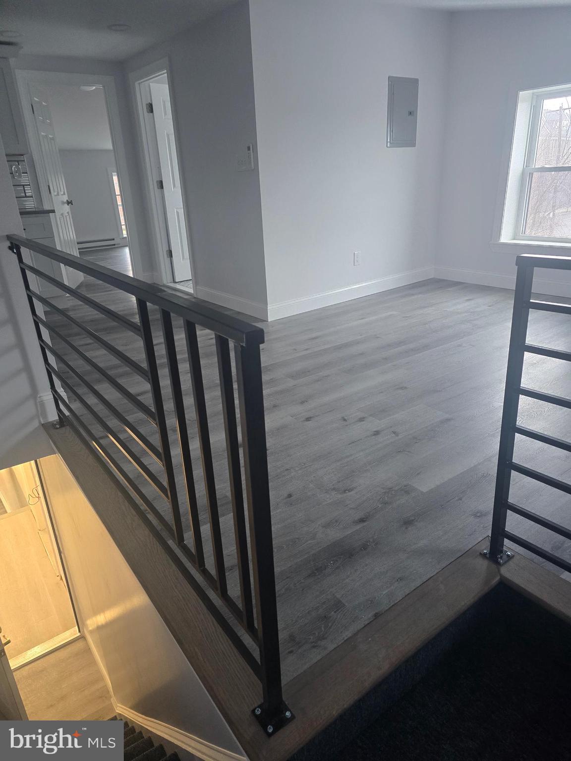 5925 Ridge Avenue, Unit 4 Philadelphia, PA 19128 - Photo 4 of 15 a view of balcony with wooden floor
