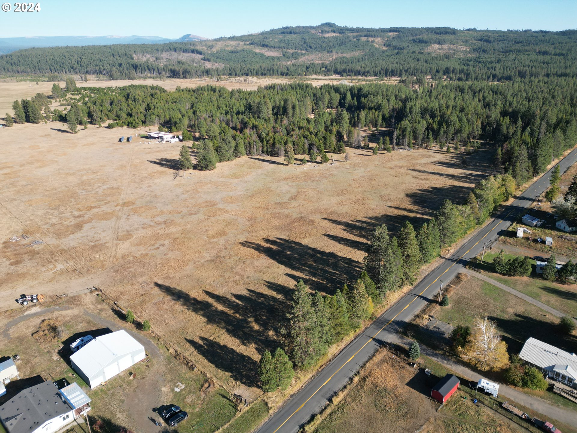 Lakeside Road Glenwood, WA 98619 - Photo 4 of 14 a view of a backyard with sitting area