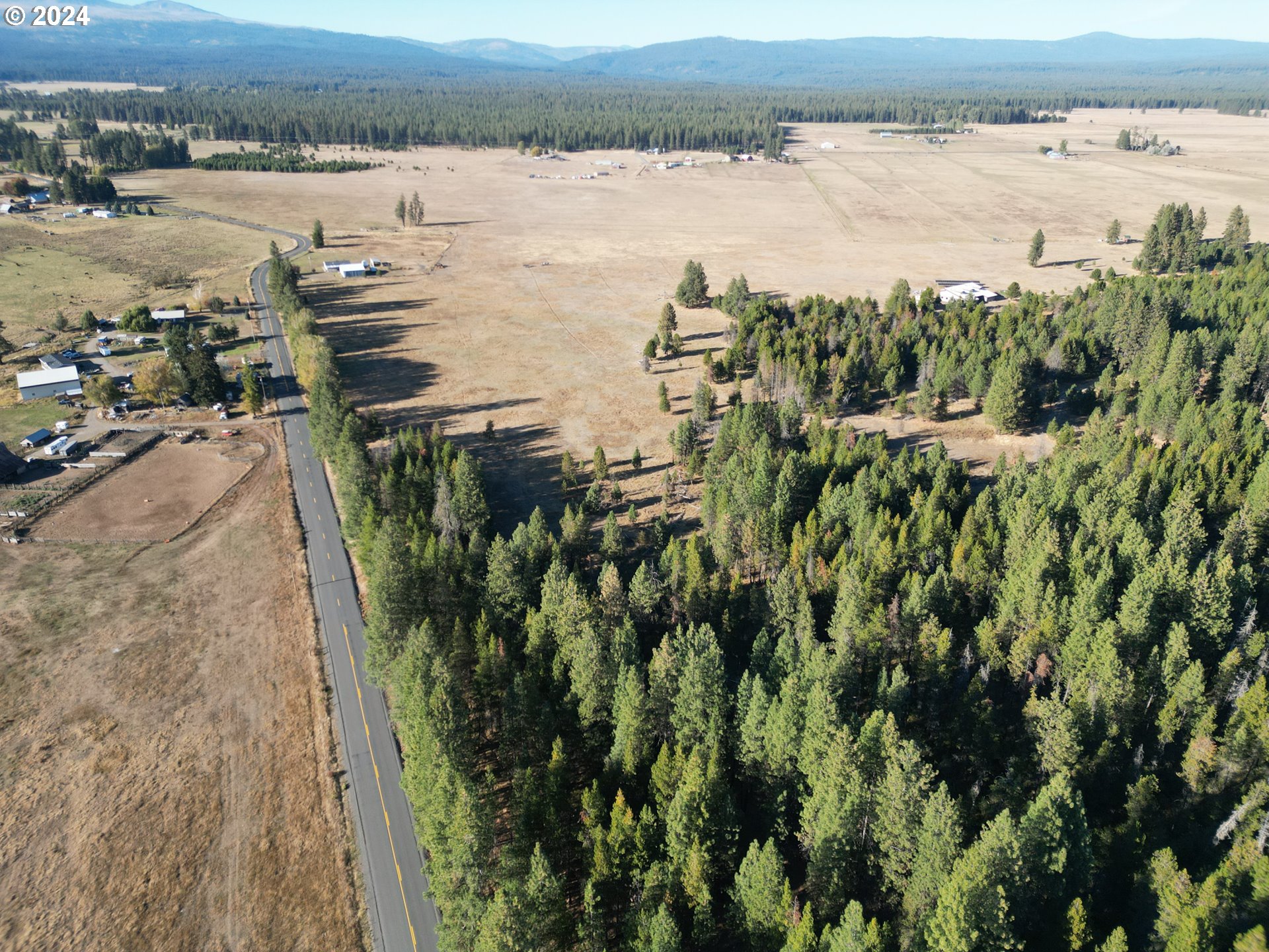 Lakeside Road Glenwood, WA 98619 - Photo 7 of 14 a view of a lake with houses in the back