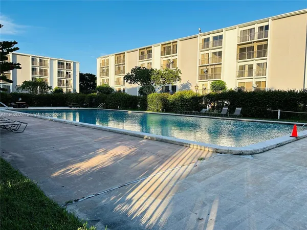 a view of a house with a swimming pool