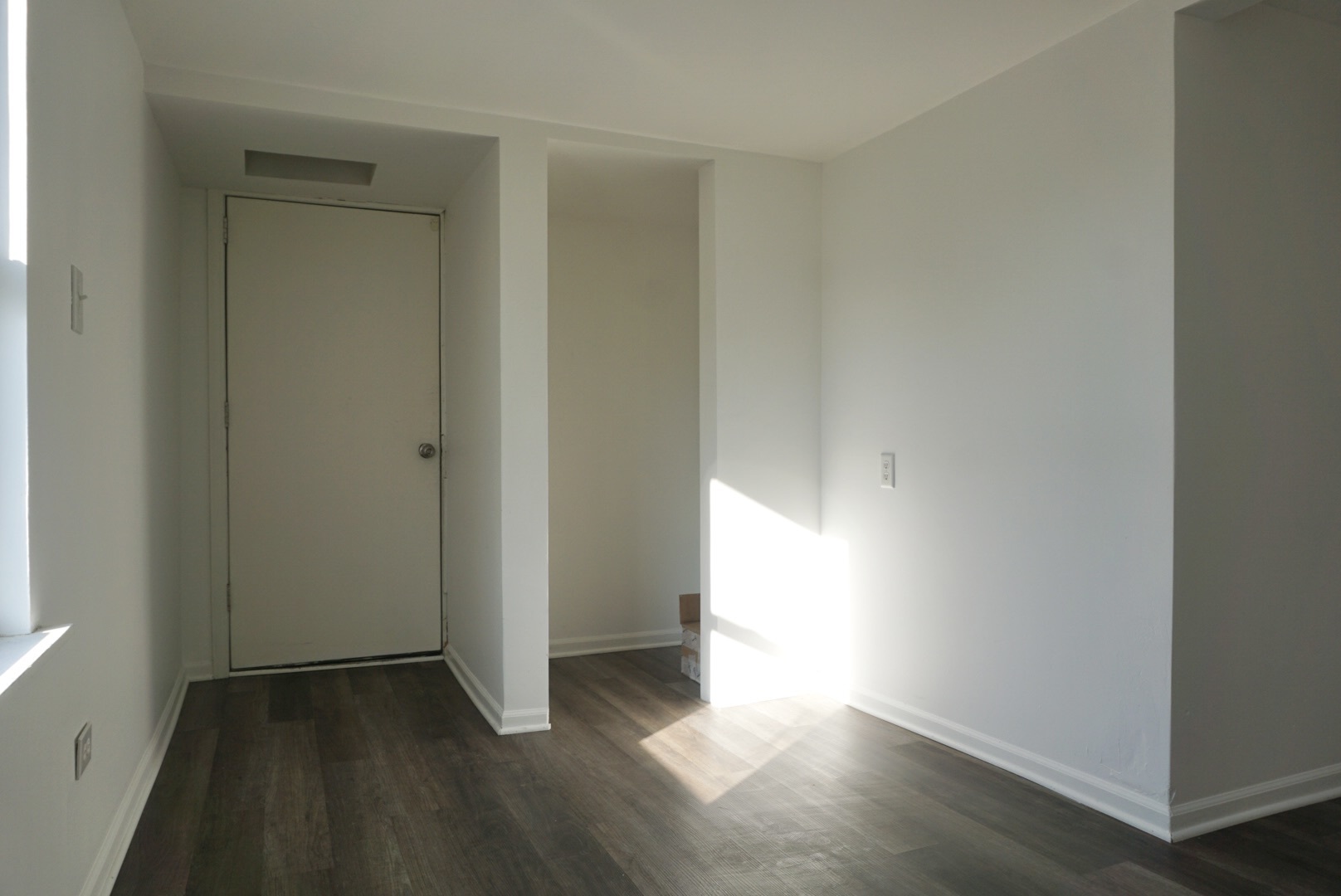 2502 West 46th Street, Unit 2 Chicago, IL 60632 - Photo 11 of 11 an empty room with wooden floor and windows