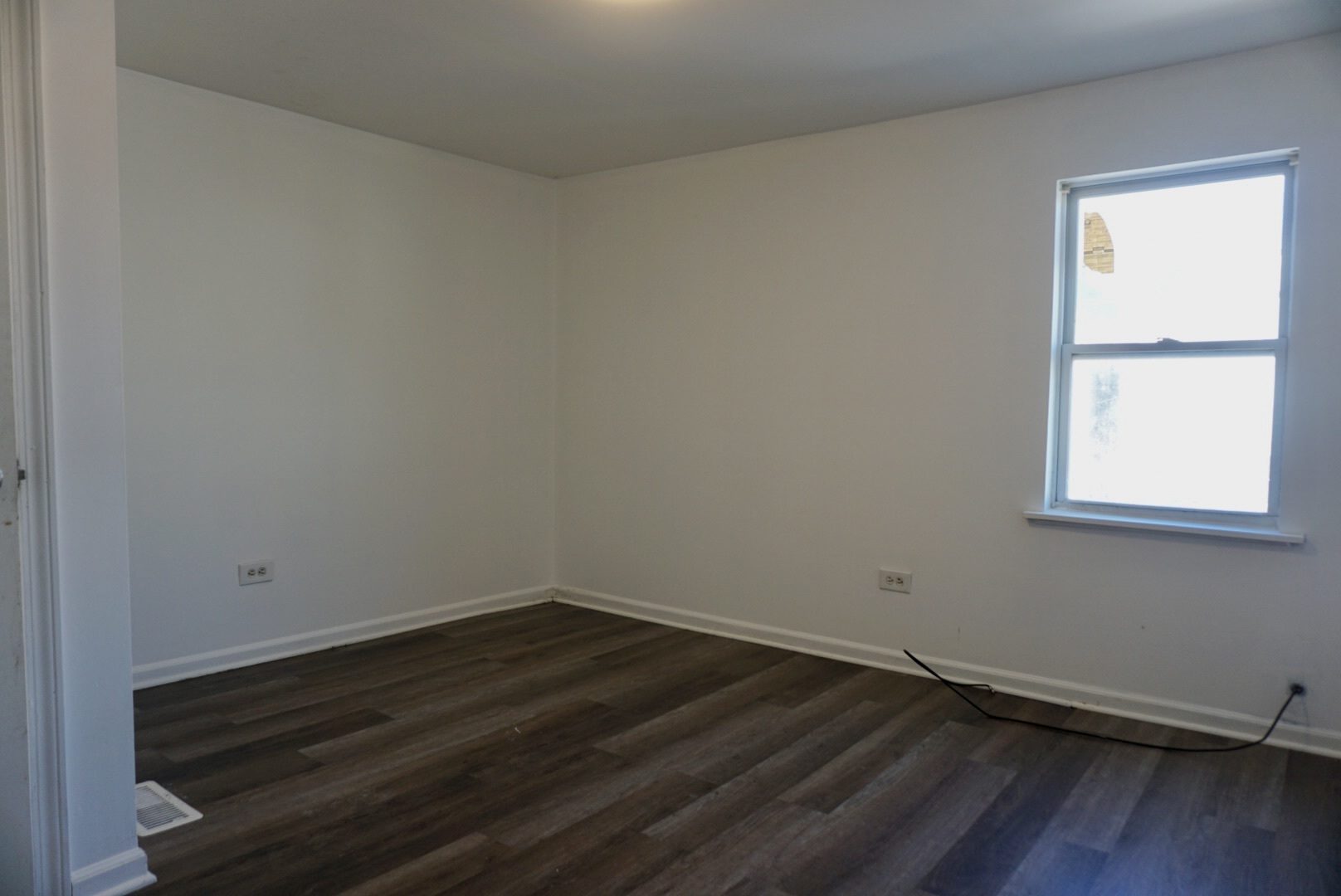 2502 West 46th Street, Unit 2 Chicago, IL 60632 - Photo 9 of 11 a room with a window