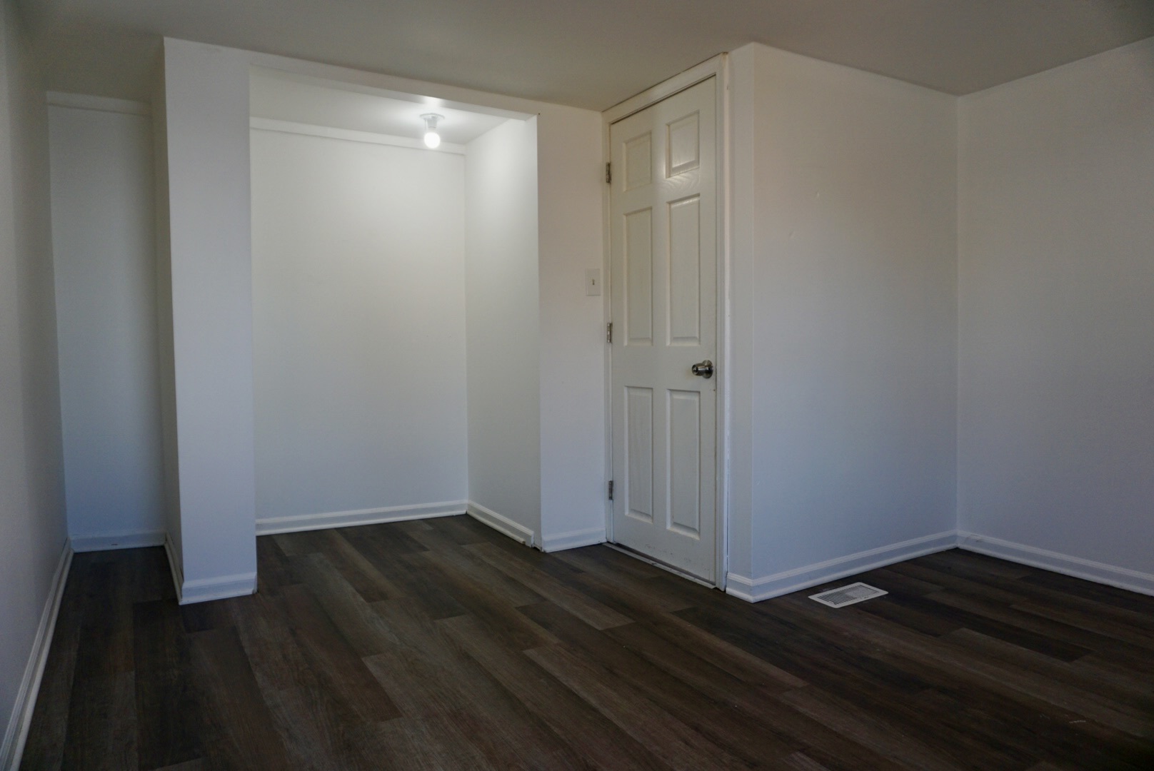 2502 West 46th Street, Unit 2 Chicago, IL 60632 - Photo 10 of 11 a view of an empty room with wooden floor