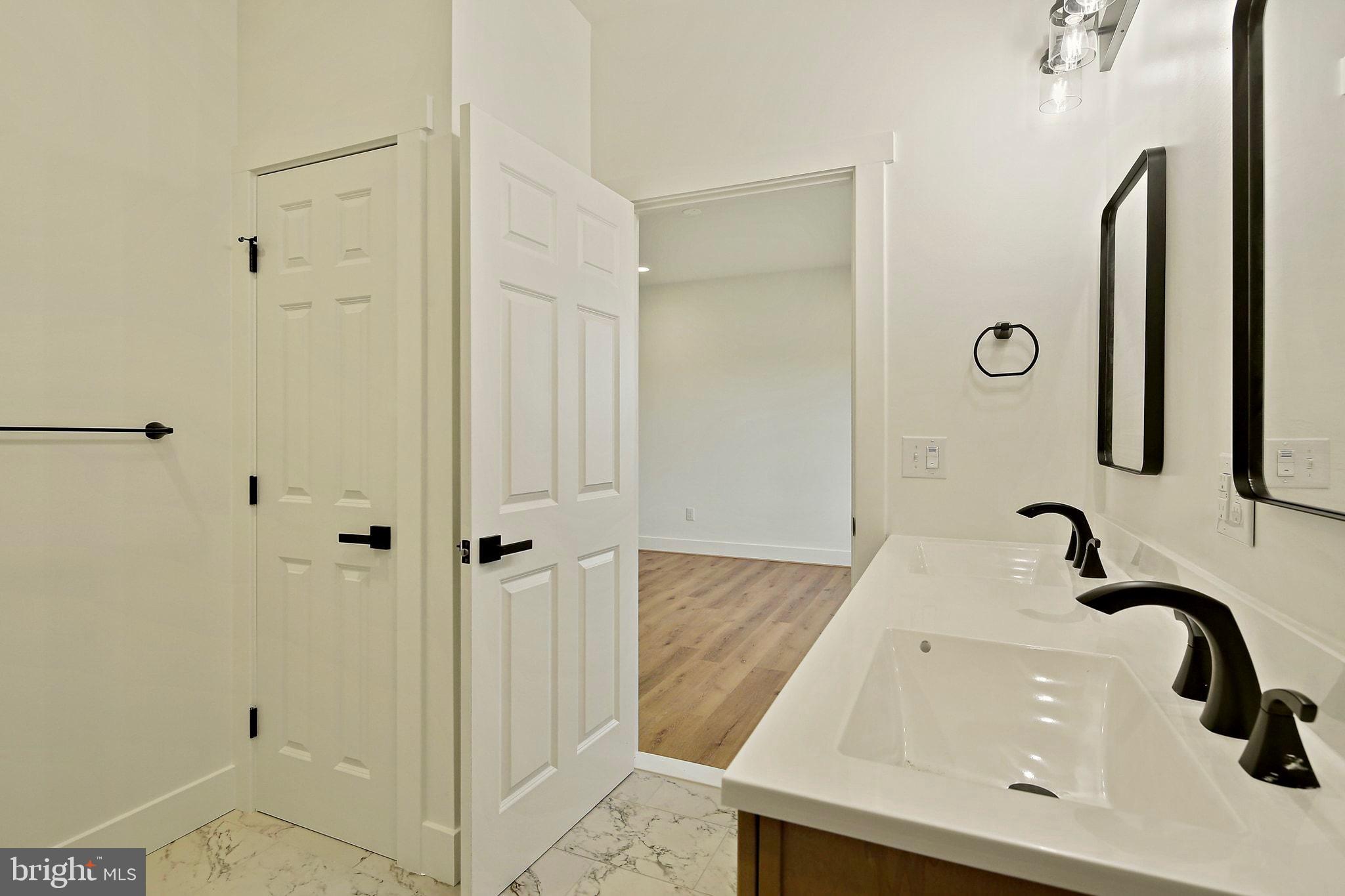 335 East Snyder Corner Road Red Lion, PA 17356 - Photo 11 of 34 a bathroom with a sink a toilet and shower