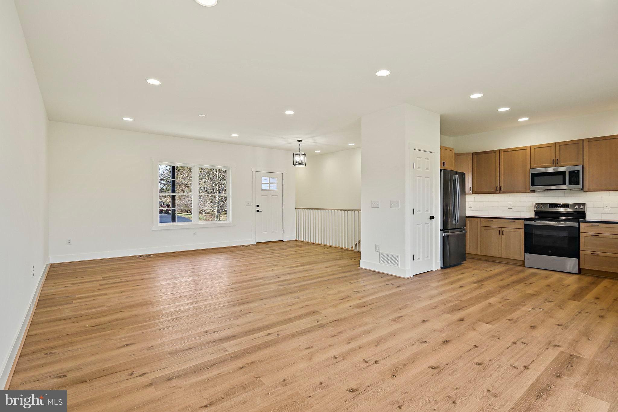 335 East Snyder Corner Road Red Lion, PA 17356 - Photo 5 of 34 a view of a kitchen with a sink and a refrigerator