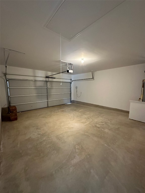 2513 Four Waters Loop Georgetown, TX 78628 - Photo 34 of 37 Garage featuring baseboards