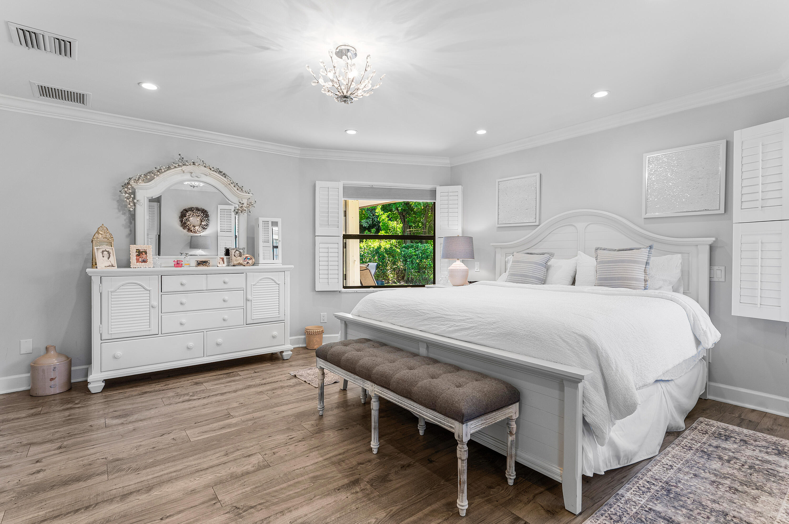 629 Cypress Key Circle Atlantis, FL 33462 - Photo 31 of 67 a bedroom with a bed and a view of bathroom