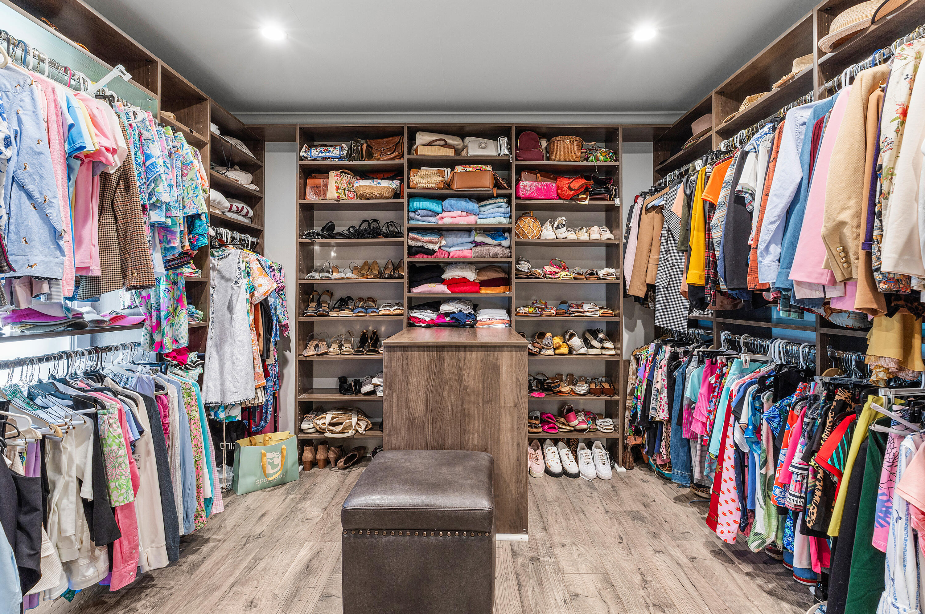 629 Cypress Key Circle Atlantis, FL 33462 - Photo 39 of 67 a view of walk in closet with clothes