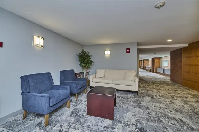 a living room with furniture and a couch
