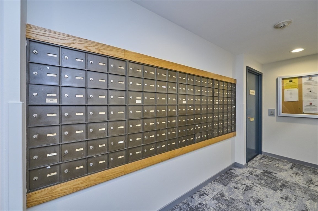193 Oak Street, Unit 403 Newton, MA 02464 - Photo 18 of 21 a view of a living room and a window