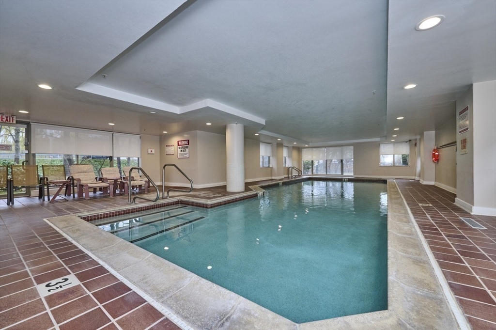 193 Oak Street, Unit 403 Newton, MA 02464 - Photo 9 of 21 a view of a room with gym equipment