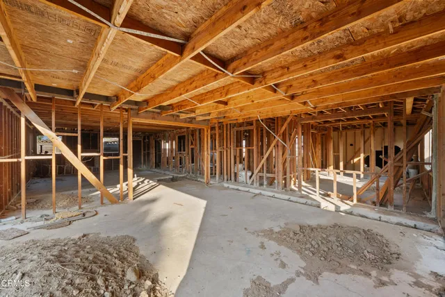 a view of a storage room with wooden walls
