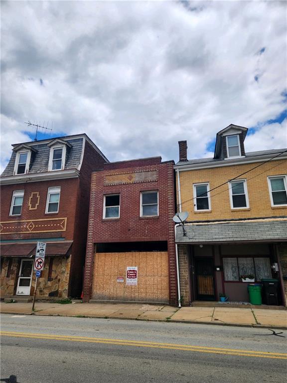 1802 Main Street Pittsburgh, PA 15215 - Photo 2 of 2 a front view of a house with a lots of windows