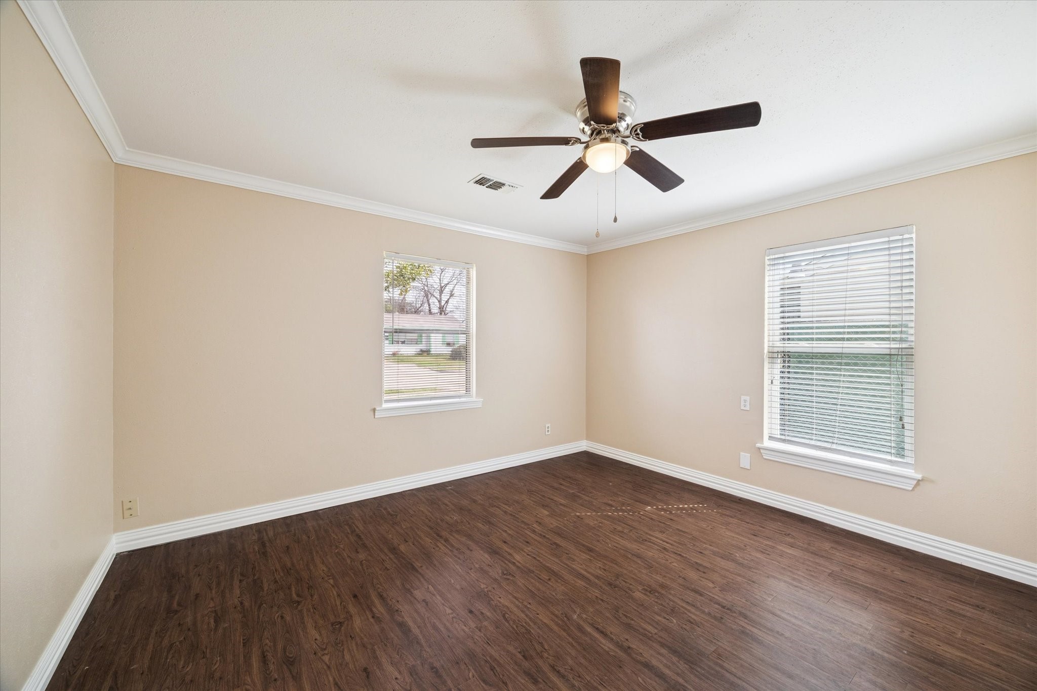 434 Meters Street Houston, TX 77020 - Photo 6 of 10 a view of a big room with wooden floor and windows