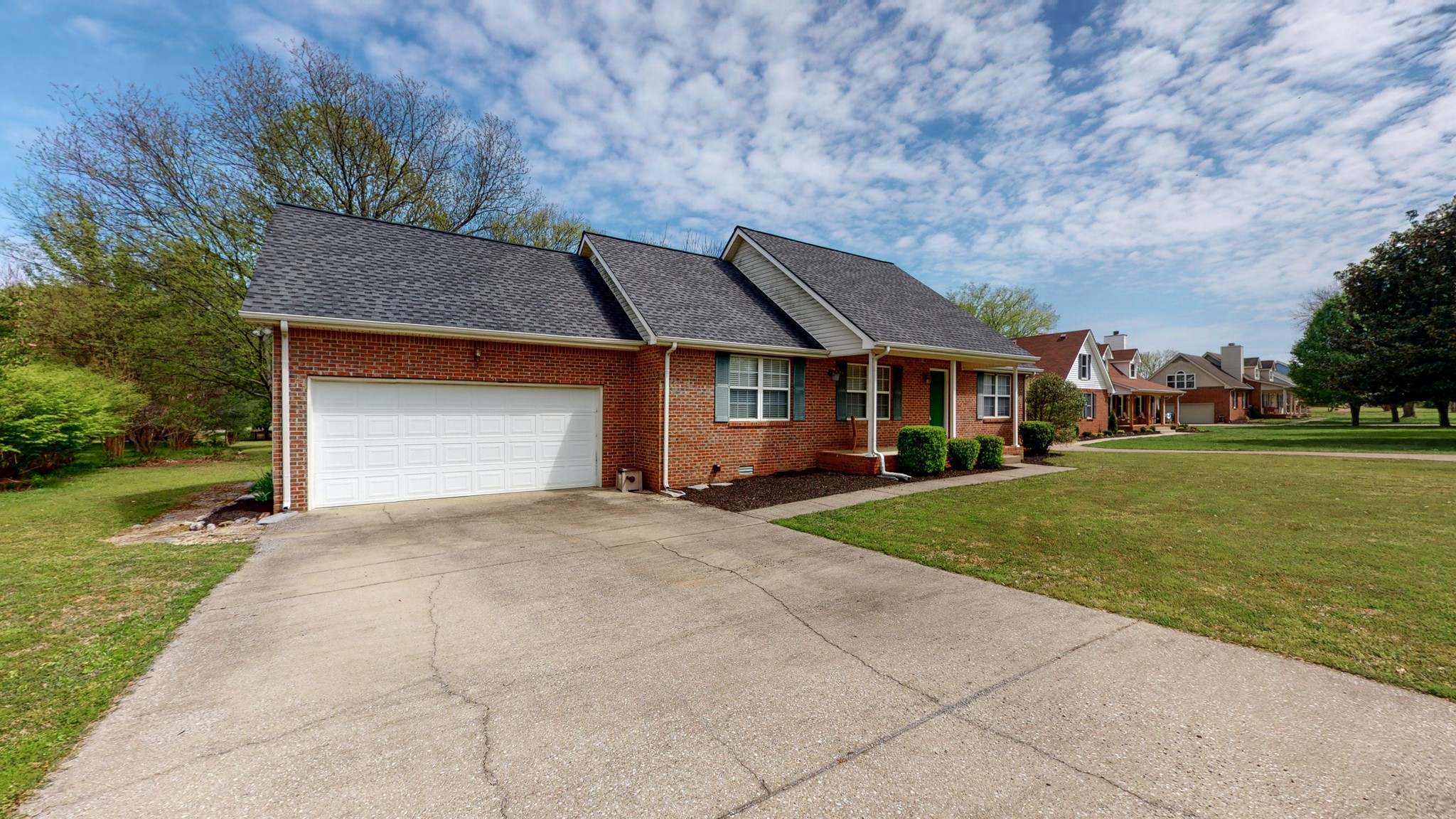 1081 Kathryn Road Mount Juliet, TN 37122 - Photo 4 of 49 a front view of a house with a yard