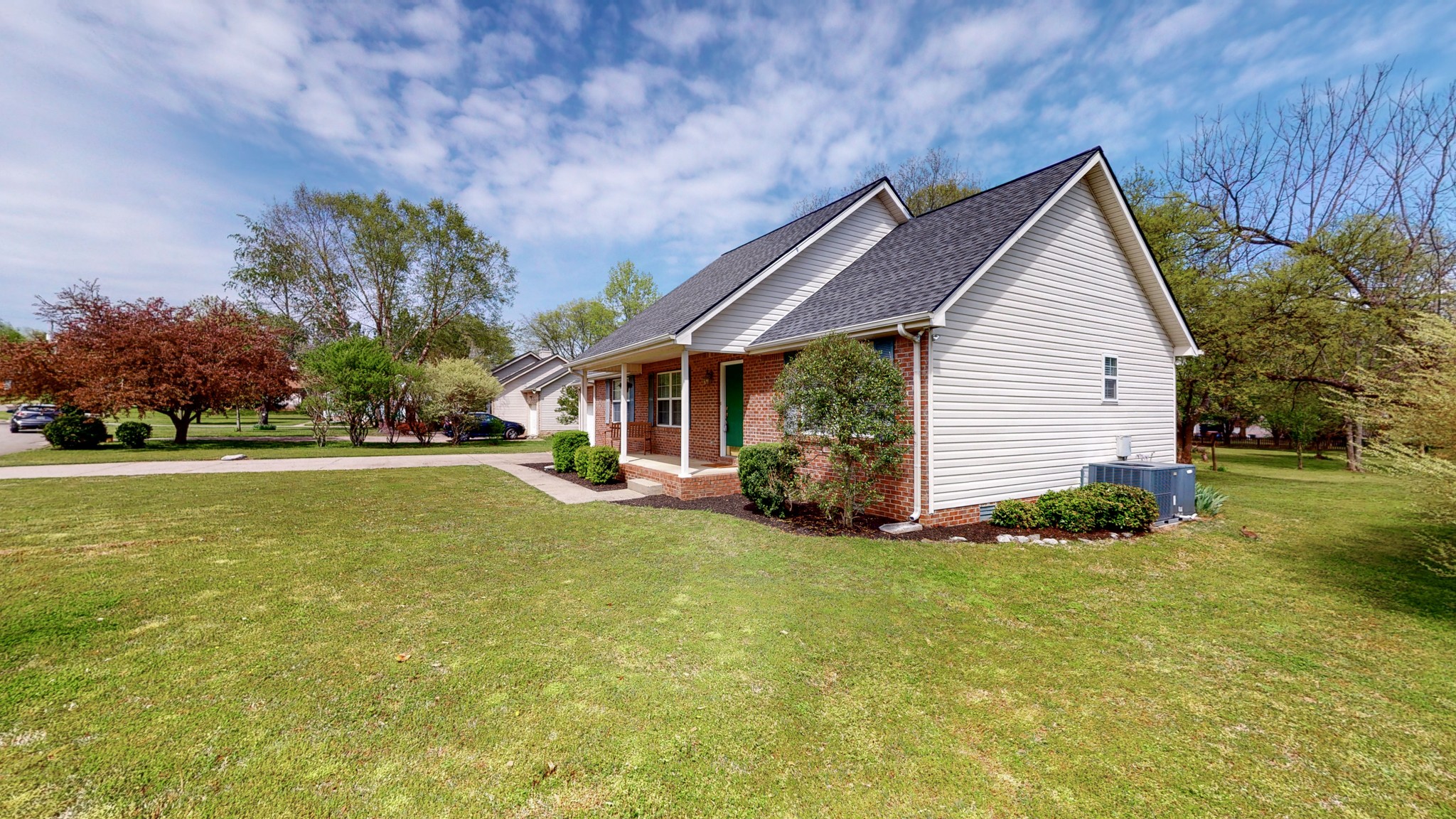 1081 Kathryn Road Mount Juliet, TN 37122 - Photo 8 of 49 a view of a house with a yard and garage